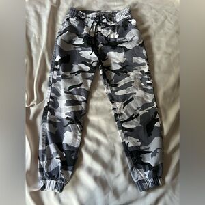 Black, white, gray camo jogger cargo pants.